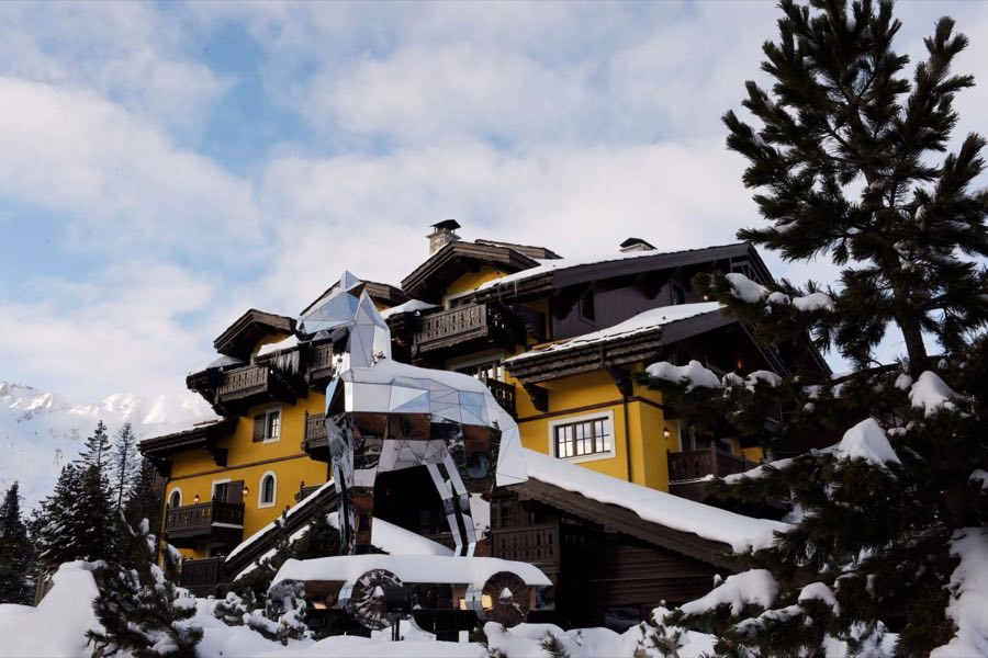Cheval Blanc Courchevel's chalet under fresh snow