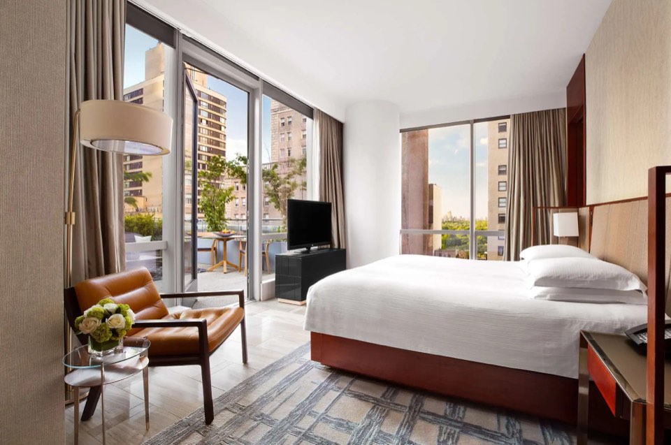A corner guest room with city views at Park Hyatt New York